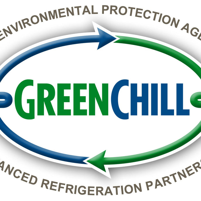 Close-up of labeled refrigerant cylinder used in GreenChill-compliant systems.