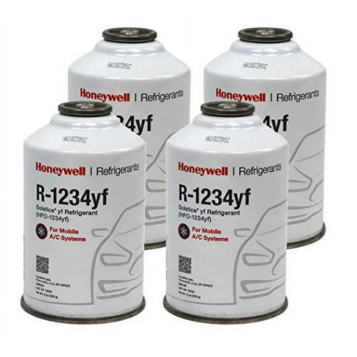Four cans of Honeywell R-1234yf Solstice refrigerant for automotive A/C systems, labeled for mobile use and packaged in a single box.